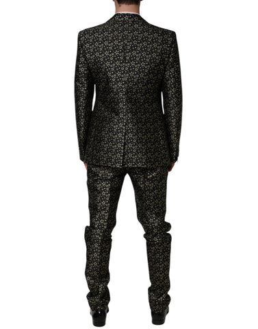 Black Stars Jacquard Sicilia 2-piece suit by Dolce & Gabbana, featuring a tailored jacket and matching trousers with star pattern.