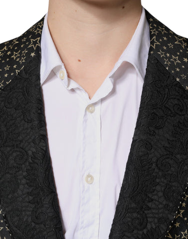 Black Stars Jacquard Sicilia 2-piece suit by Dolce & Gabbana, featuring a tailored blazer and matching trousers with star pattern detailing.
