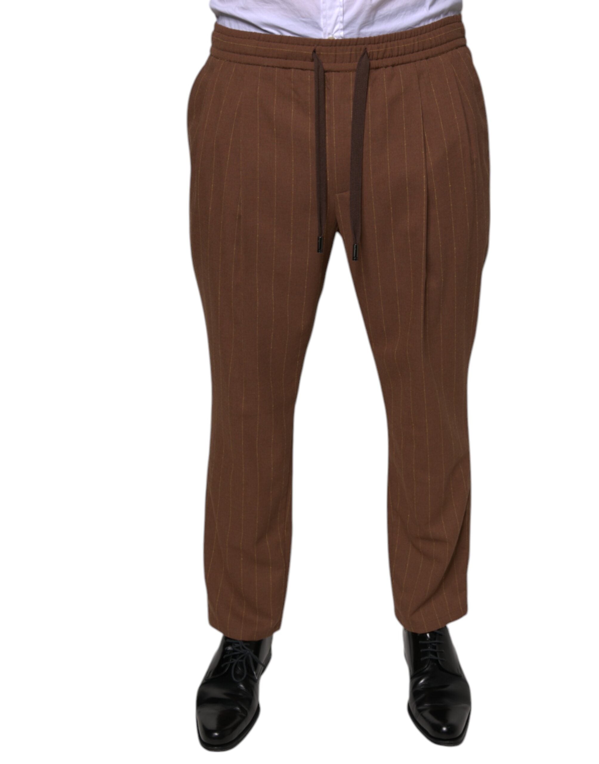 Brown striped skinny men's dress pants by Dolce & Gabbana, tailored fit with classic pattern and sleek design.