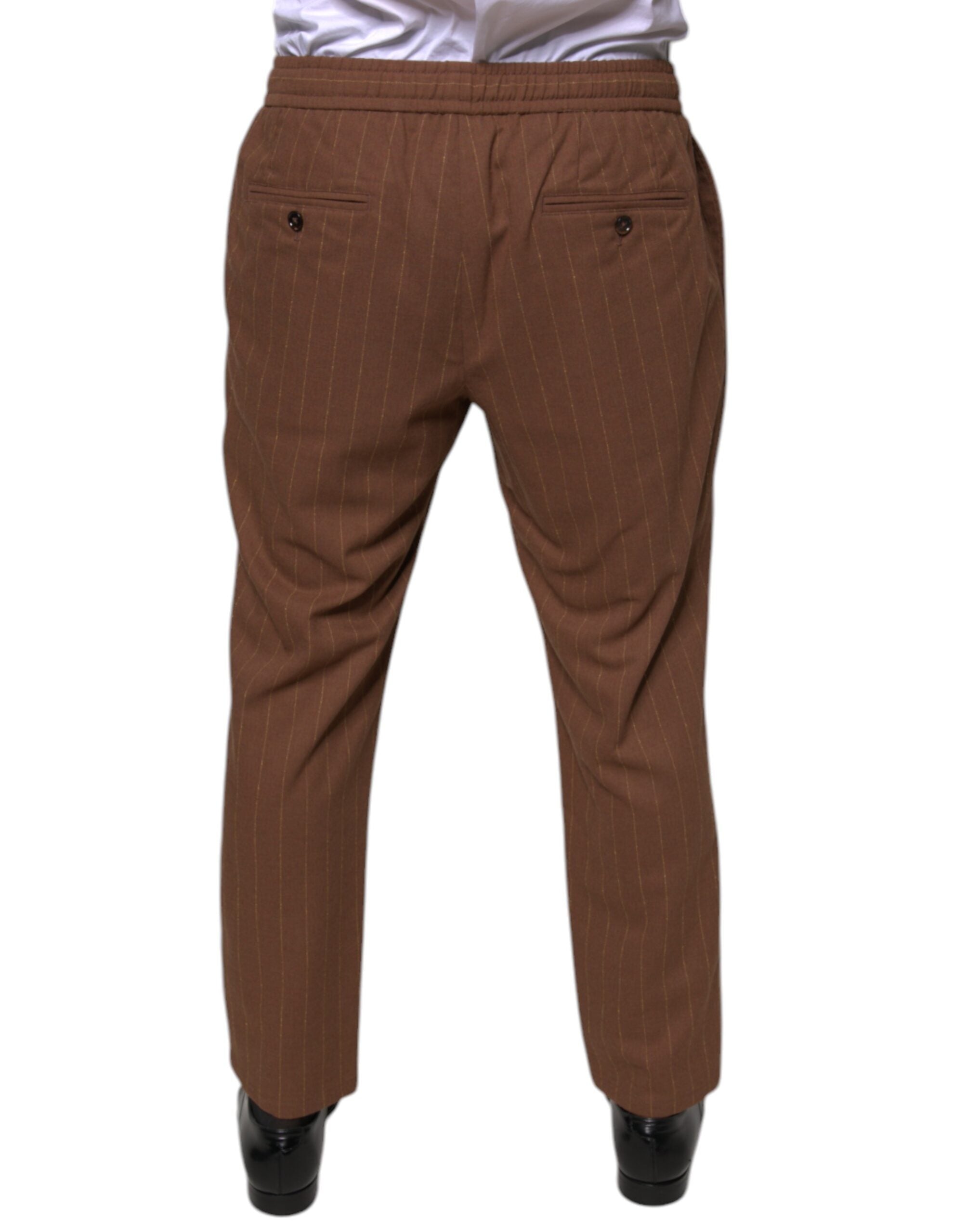 Brown striped skinny men's dress pants by Dolce & Gabbana, tailored fit with sharp creases and stylish design.