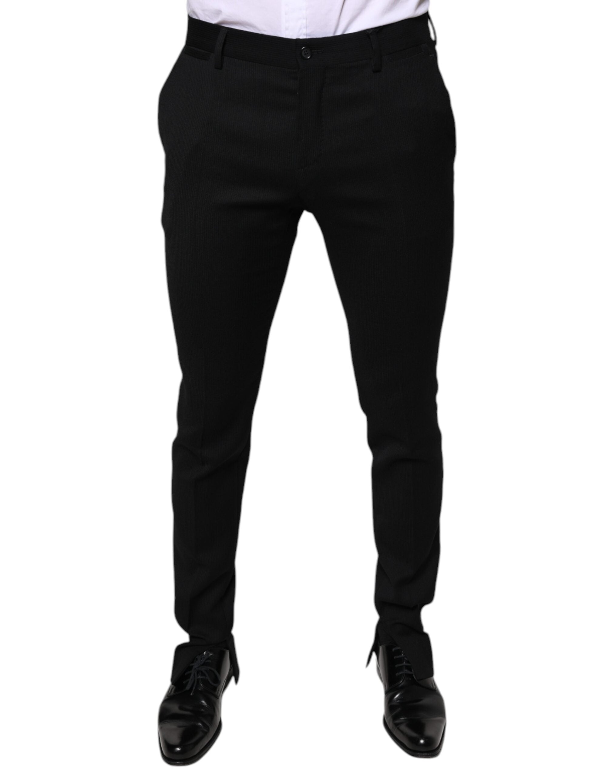 Black wool skinny formal dress pants by Dolce & Gabbana, tailored fit with sleek design and classic style.