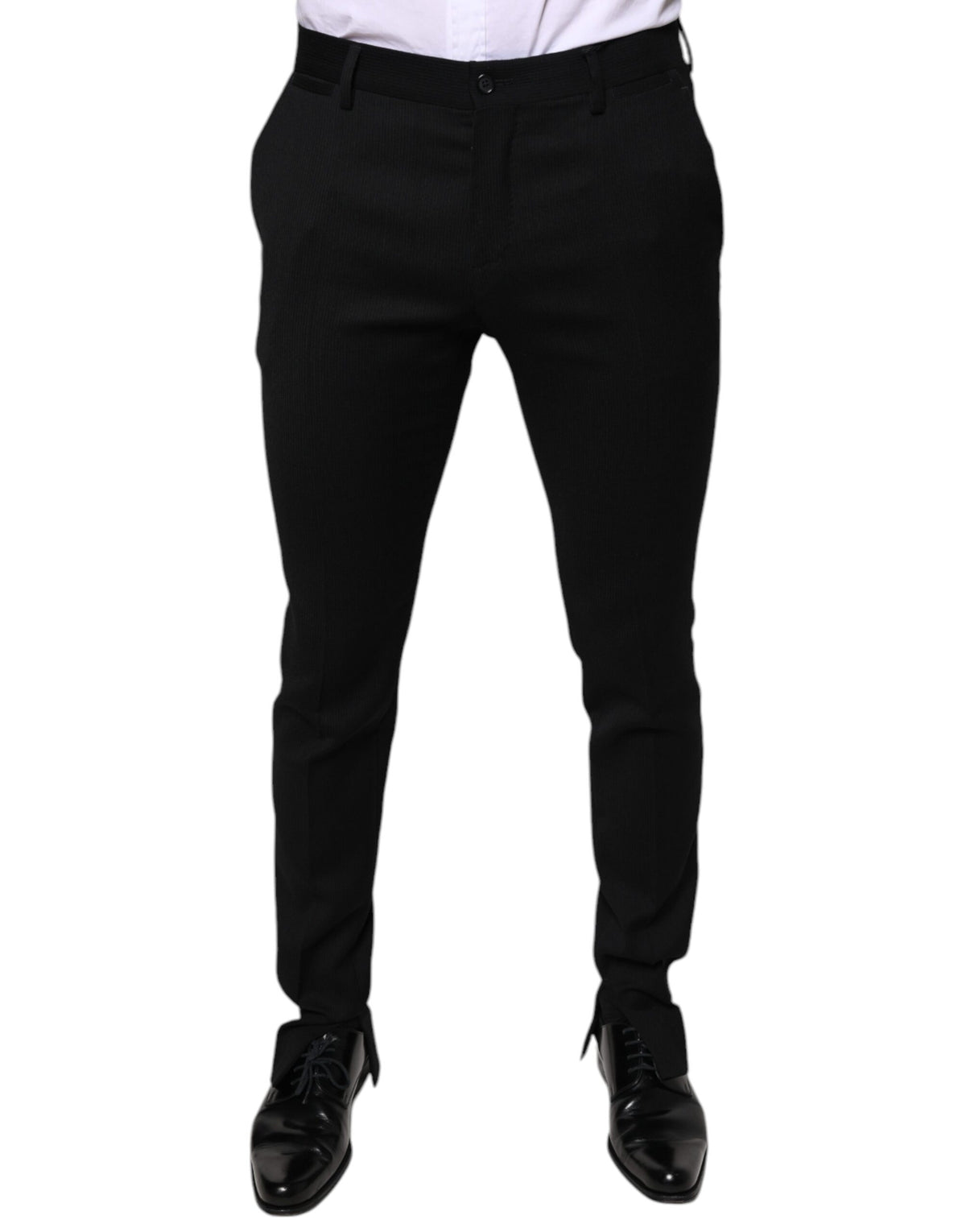 Black wool skinny formal dress pants by Dolce & Gabbana, tailored fit with sleek waistband and classic design.