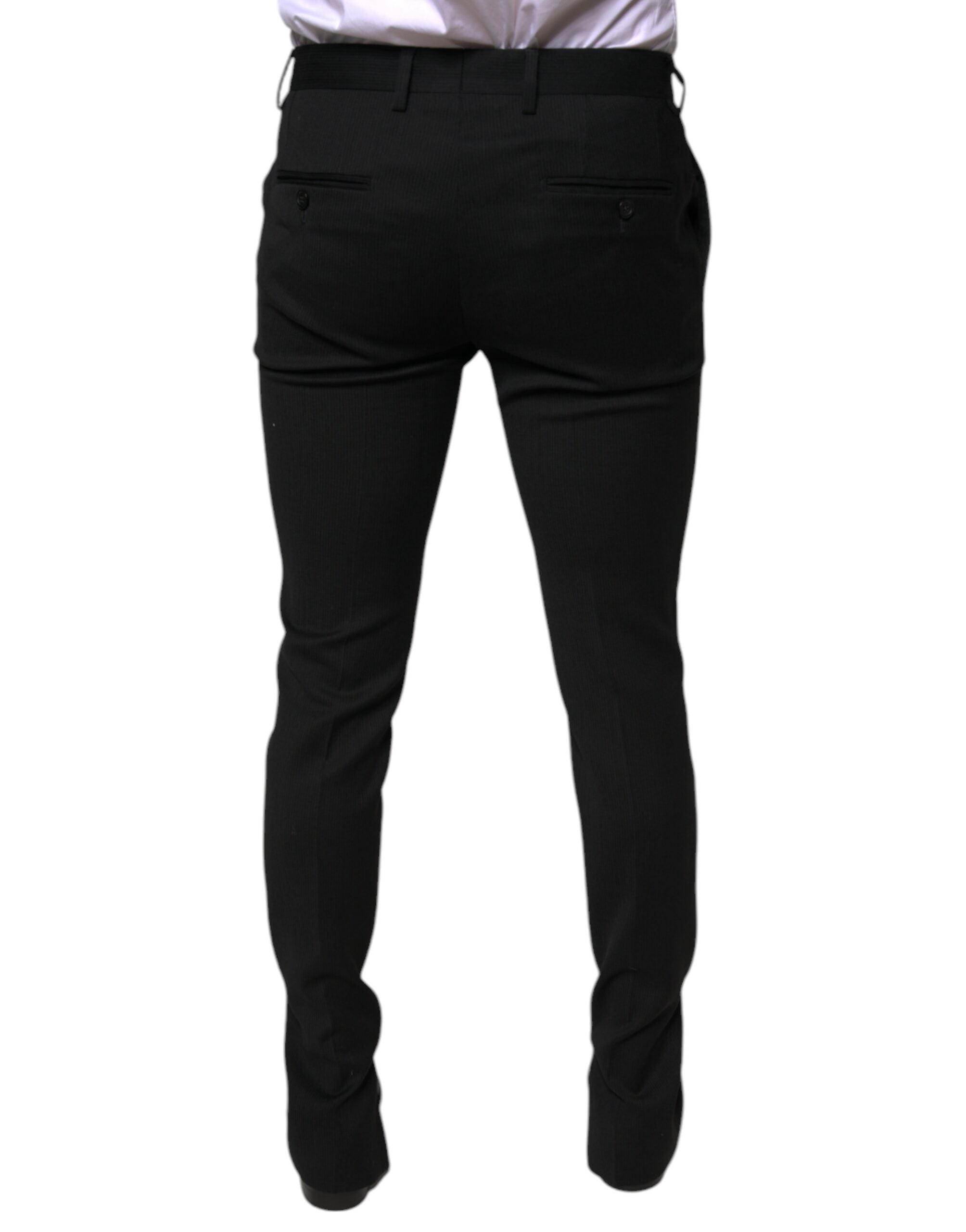 Black wool skinny formal dress pants by Dolce & Gabbana, tailored fit with sleek design for professional occasions.