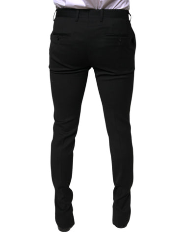 Black wool skinny formal dress pants by Dolce & Gabbana, tailored fit with sleek design for professional occasions.