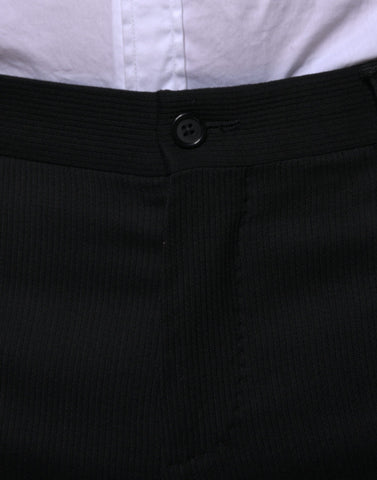 Black wool skinny formal dress pants by Dolce & Gabbana, tailored fit with sleek, elegant design for sophisticated occasions.