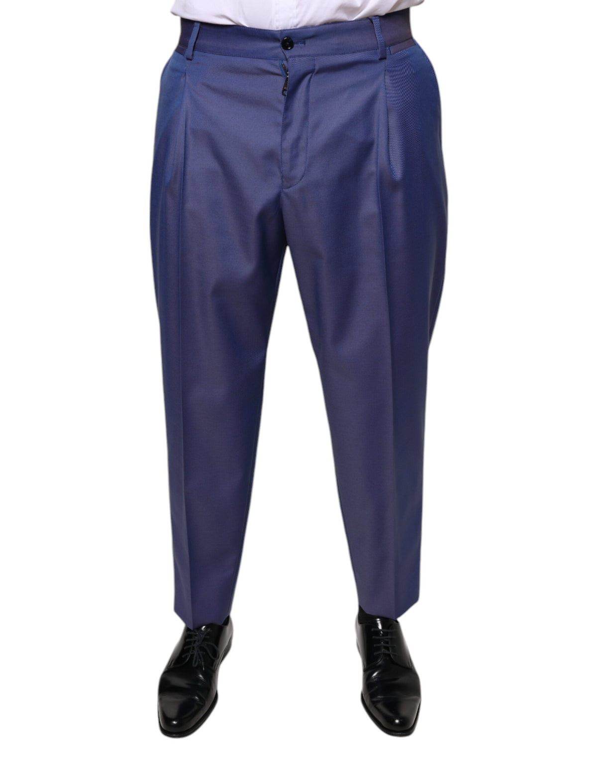 Blue wool tapered formal dress pants by Dolce & Gabbana, shown on a model with a tailored fit and classic crease.