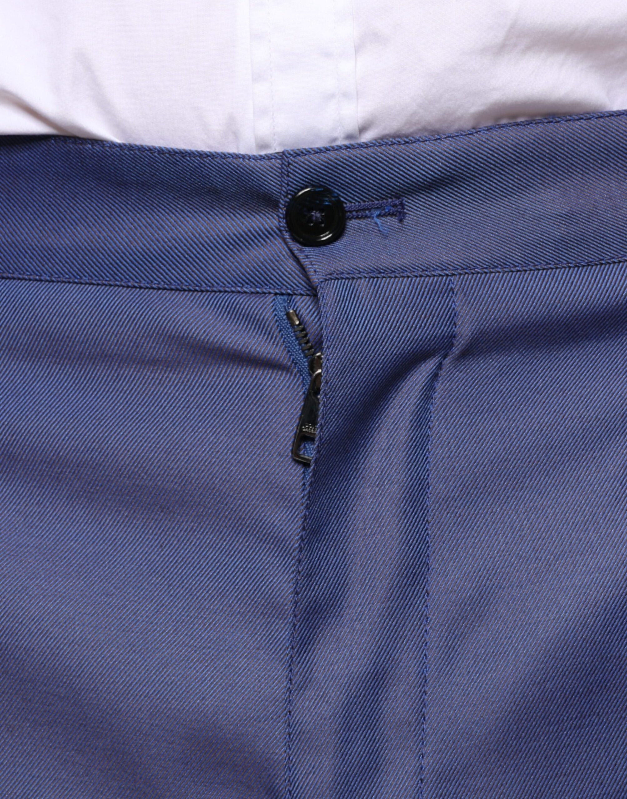 Blue wool tapered formal dress pants by Dolce & Gabbana, featuring a tailored fit and classic style.