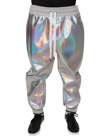 Silver iridescent men's jogger sweatpants by Dolce & Gabbana with elastic waistband and tapered fit, shown on a plain background.