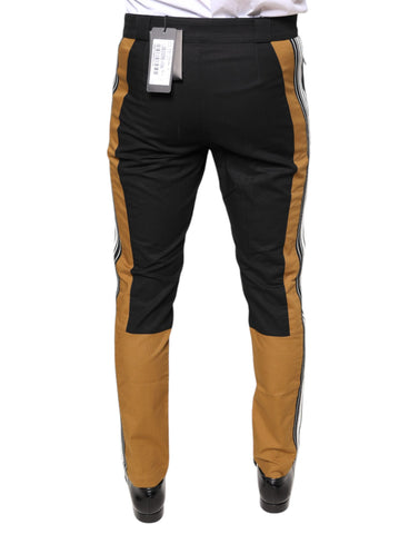 Multicolor stripe skinny cotton pants by Dolce & Gabbana, featuring vibrant vertical stripes and a slim fit design.