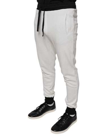 White cotton slim fit men's jogger sweatpants by Dolce & Gabbana, featuring a relaxed fit and elastic waistband.