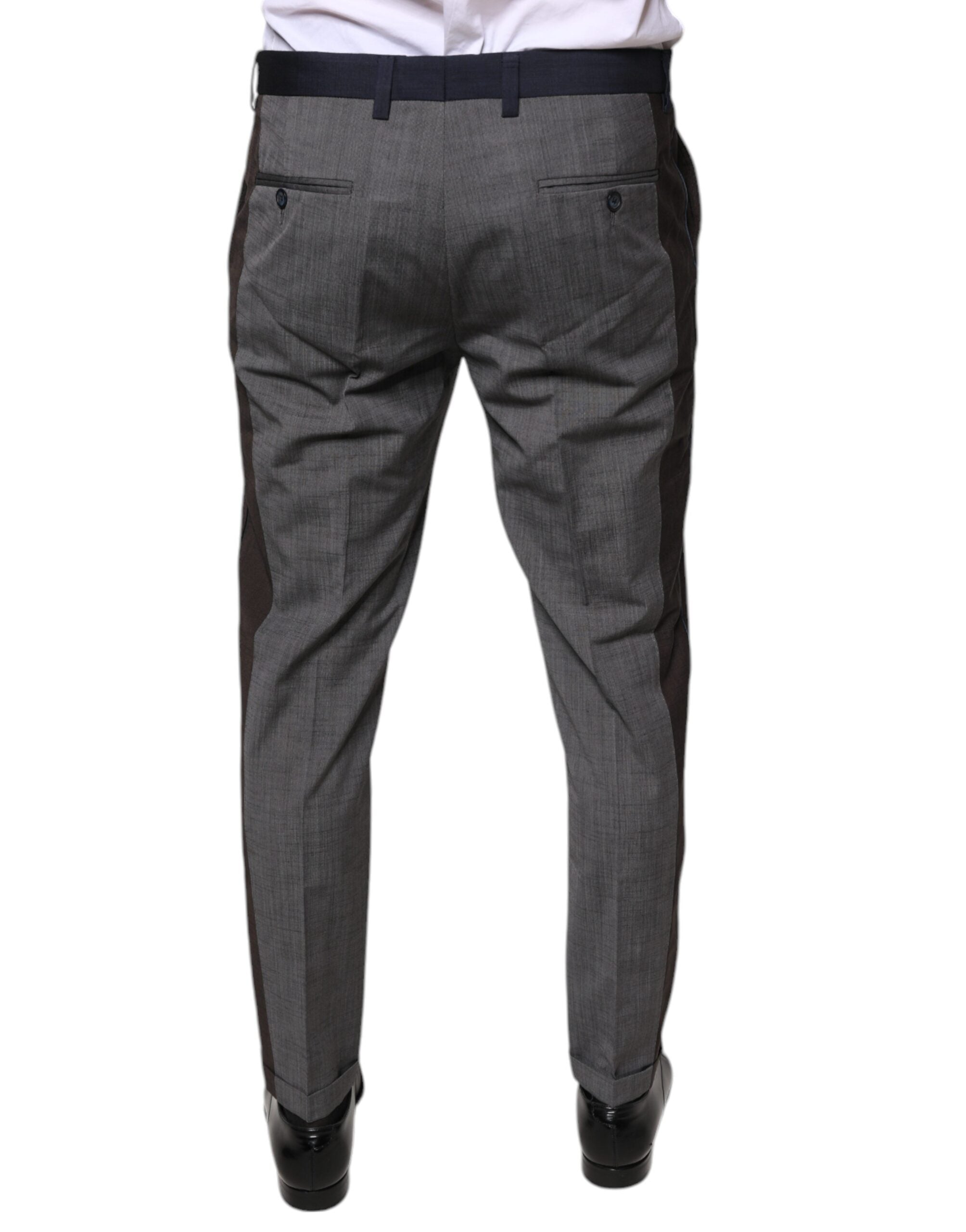 Black cotton wool formal dress pants by Dolce & Gabbana, tailored fit with classic waistband and sleek, elegant design.