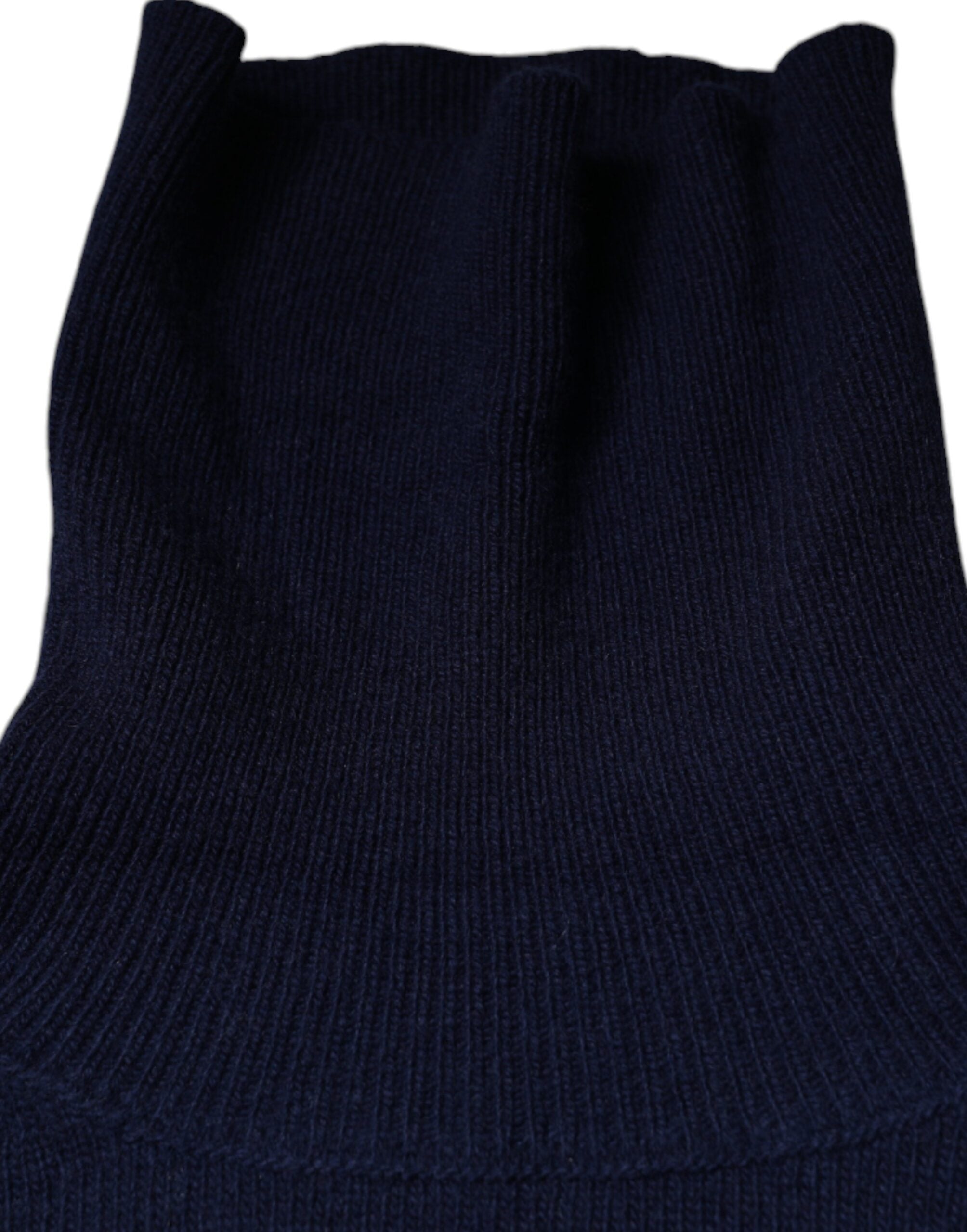 Blue wool knit turtleneck pullover sweater by Dolce & Gabbana, showing a close-up of the textured fabric and classic fit.
