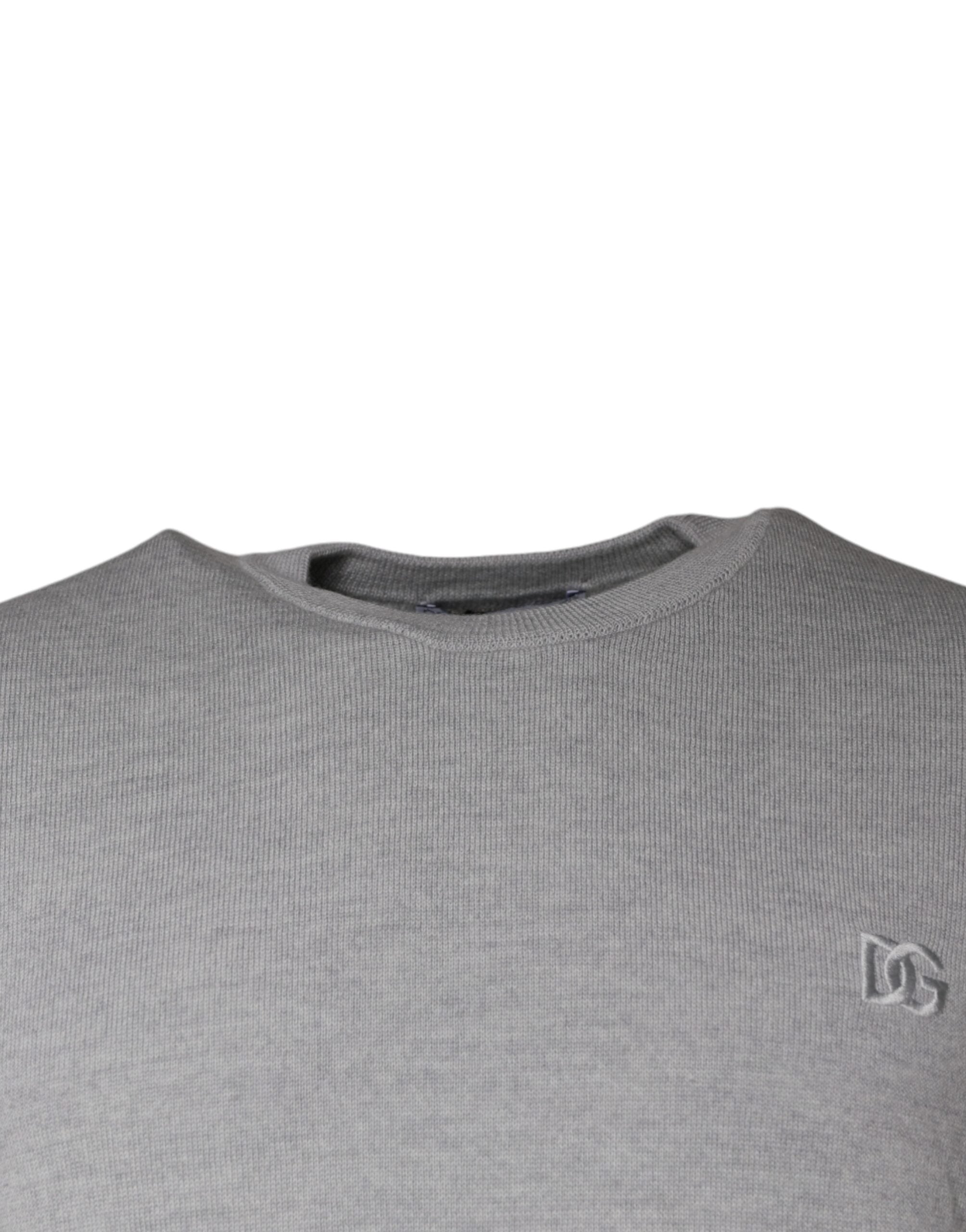 Light gray wool crew neck pullover sweater by Dolce & Gabbana, featuring a classic fit and textured knit fabric.