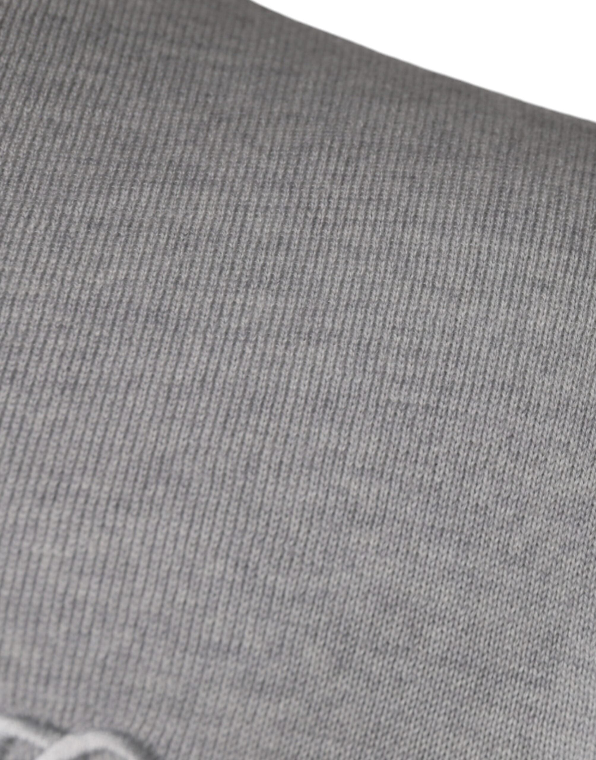 Light gray wool crew neck pullover sweater by Dolce & Gabbana, displayed on a plain background.