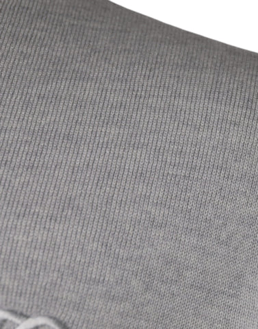 Light gray wool crew neck pullover sweater by Dolce & Gabbana, displayed on a plain background.