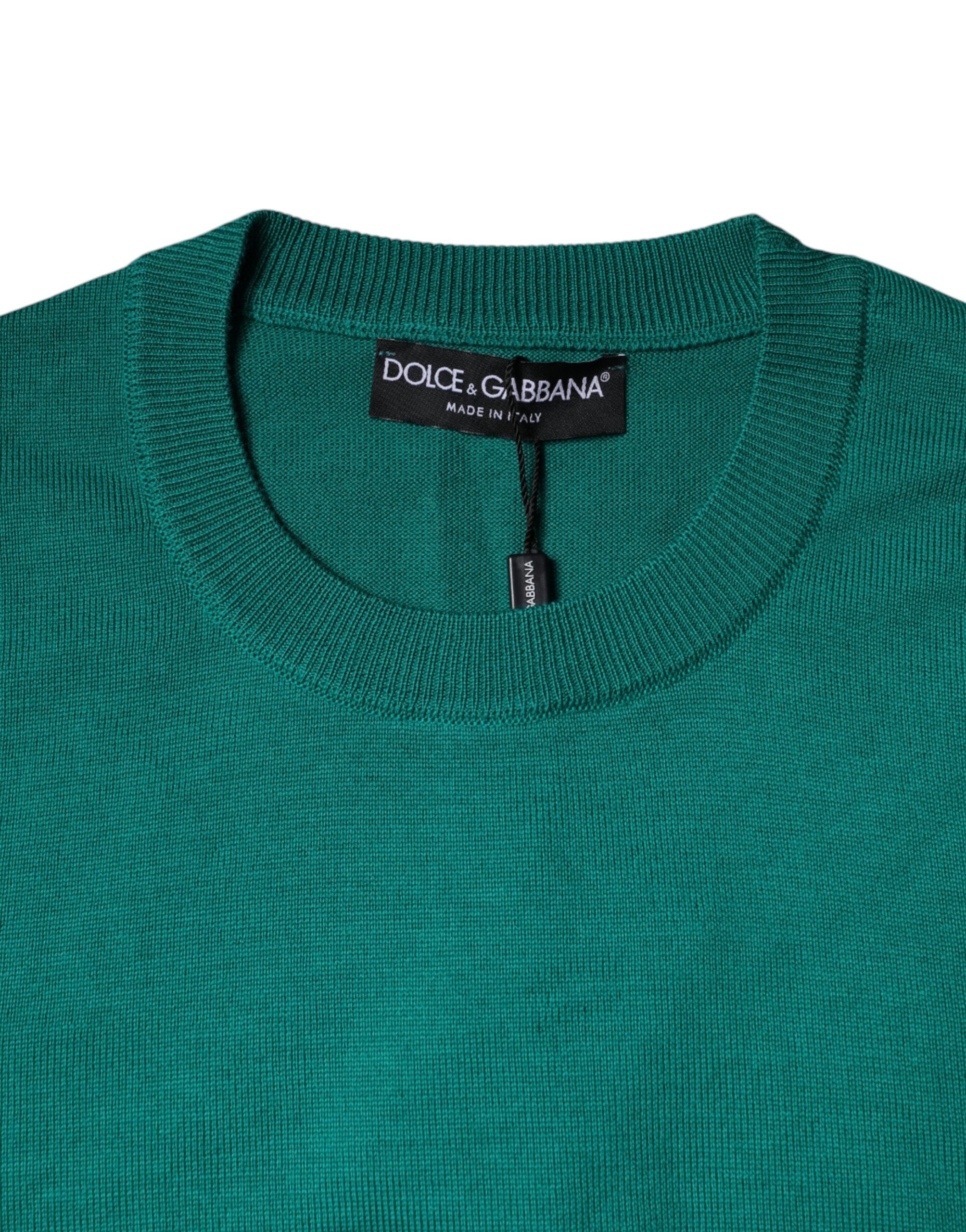 Green wool knit crew neck sweater by Dolce & Gabbana, close-up of textured knit fabric and classic collar design.