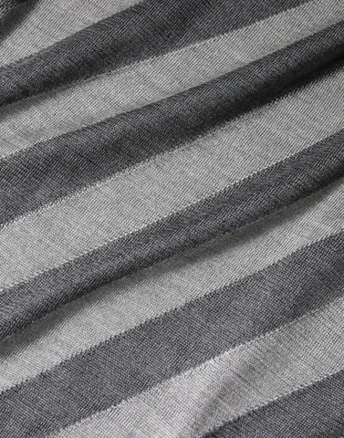 Gray striped long sleeve round neck pullover sweater by Dolce & Gabbana with a cozy knit texture.
