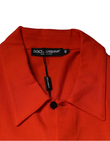 Orange cotton button-down casual polo shirt by Dolce & Gabbana, showing the front view with collar and buttons.