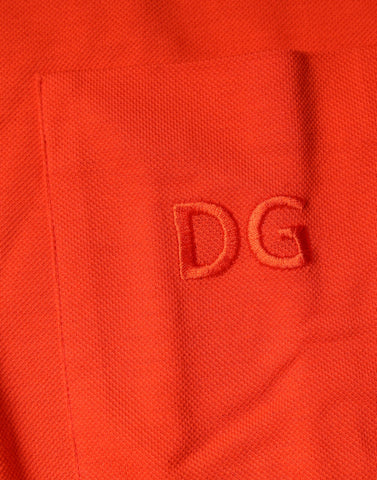 Orange cotton button-down casual polo shirt by Dolce & Gabbana, showing a classic fit with a collar and button placket.