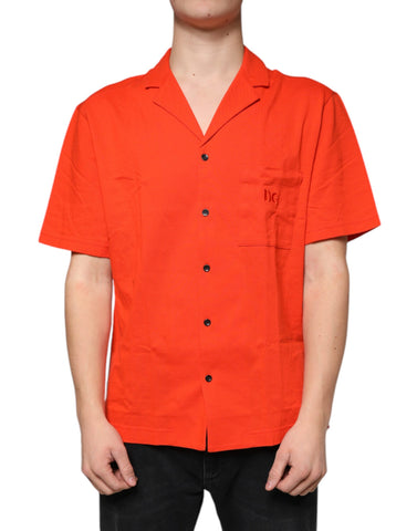 Orange cotton button-down casual polo shirt by Dolce & Gabbana, displayed flat showing collar and front buttons.