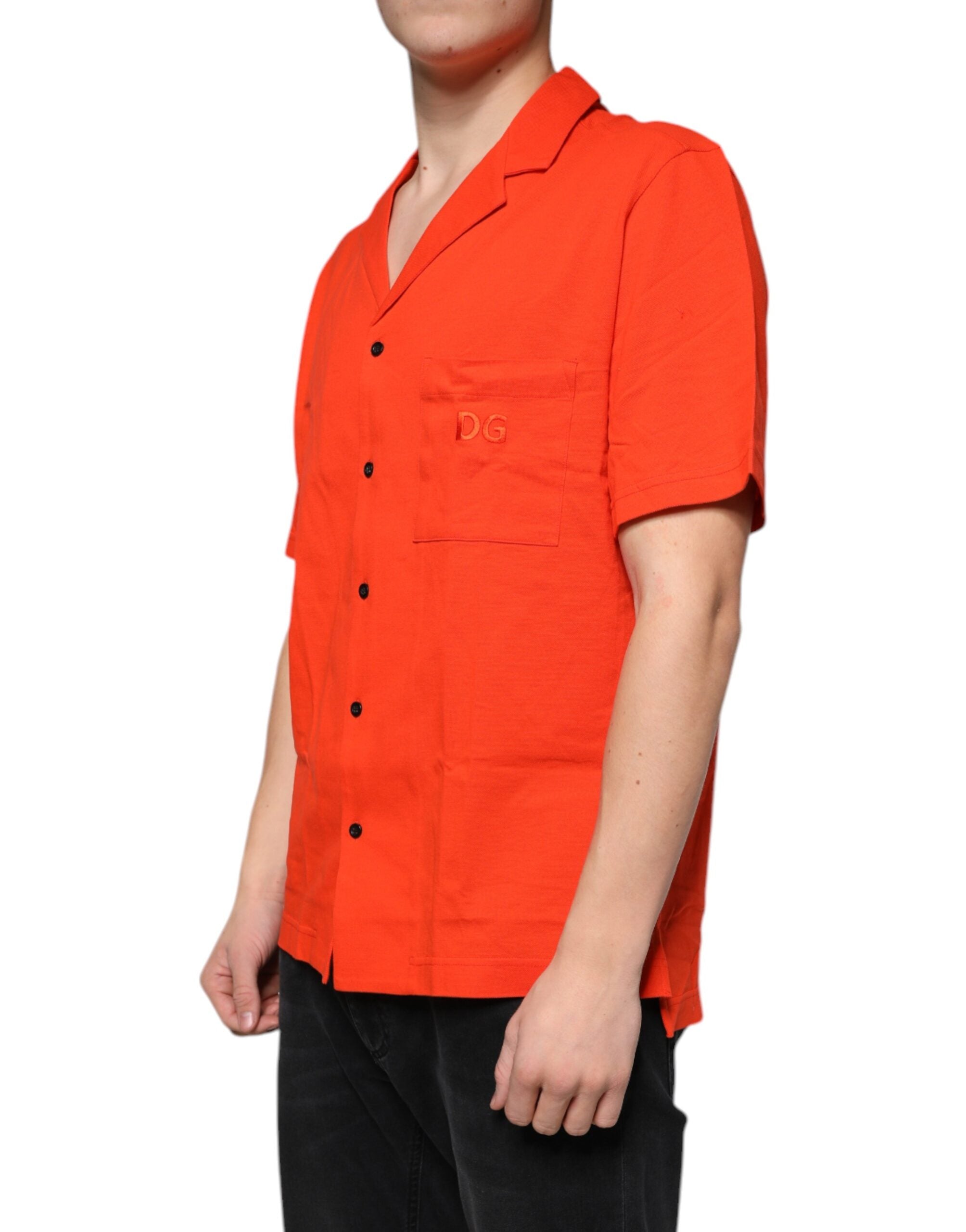 Orange cotton button-down casual polo shirt by Dolce & Gabbana, displayed on a hanger with a close-up of fabric and buttons.