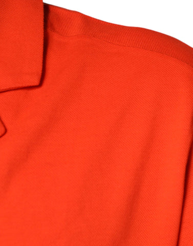 Orange cotton button-down casual polo shirt by Dolce & Gabbana, featuring a classic collar and front buttons.
