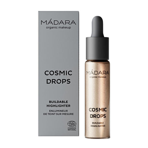 Mádara Cosmic Drops Iluminador 01 Naked Chromosphere in 13.5ml bottle, showcasing its luminous, shimmering liquid formula.