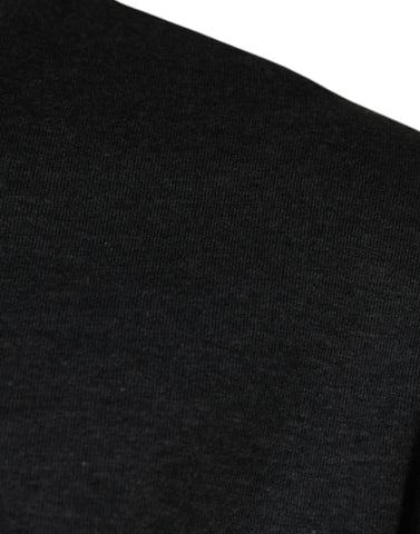 Dark gray camouflage crew neck T-shirt by Dolce & Gabbana displayed on a flat surface with visible camouflage pattern and soft fabric texture.
