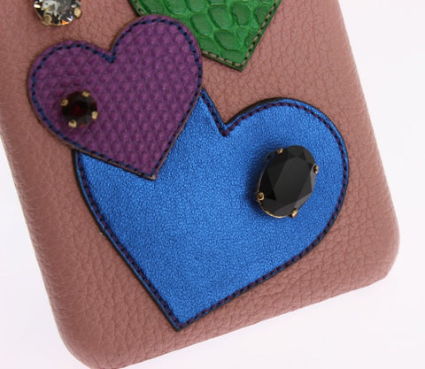 Pink leather phone case with heart-shaped crystal embellishments, designed by Dolce & Gabbana.