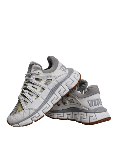 White Versace Trigreca Barocco print low-top sneakers with bold logo design and stylish comfort.