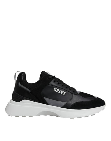 Versace black canvas quad fabric Medusa low top sneakers with lace-up design and signature Medusa logo detail.