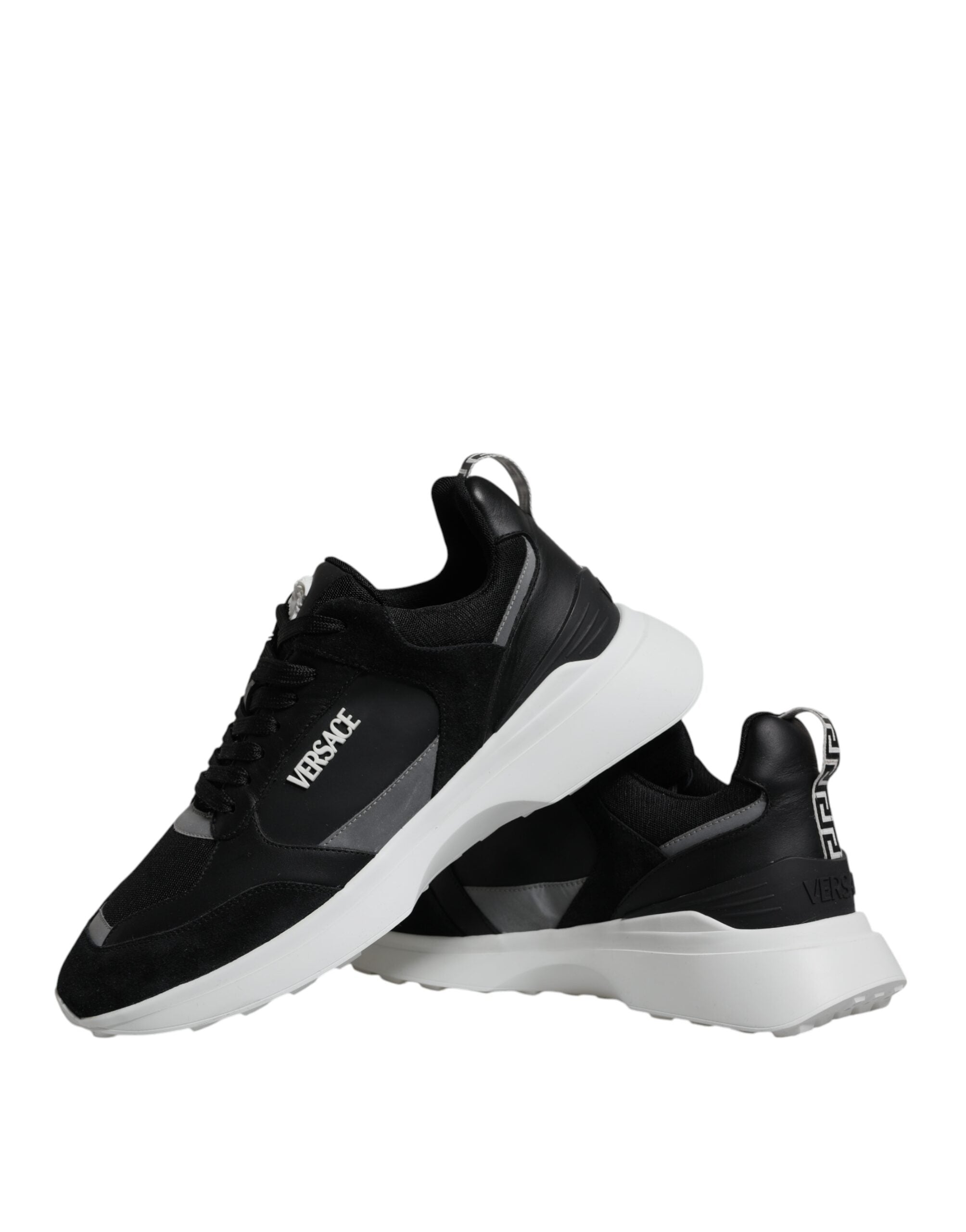 Black Versace Medusa low top sneakers with canvas quad fabric design and signature branding, stylish and comfortable footwear.