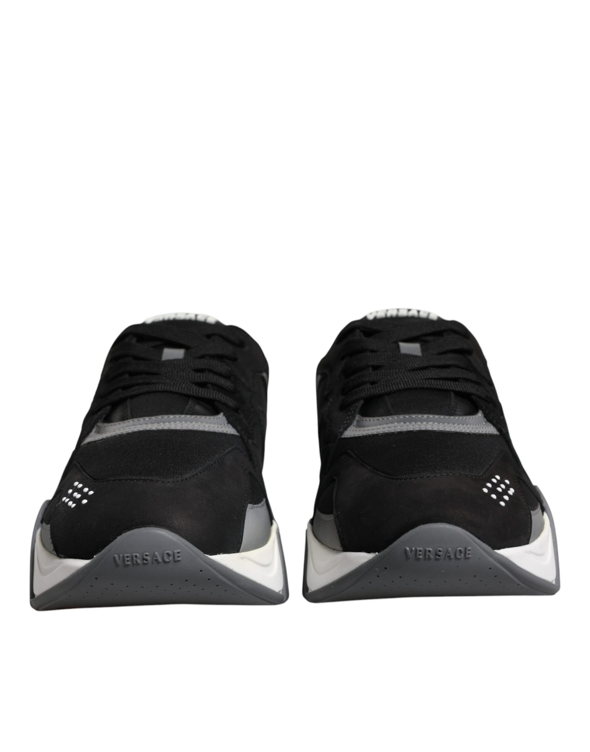 Versace Black leather and neoprene chunky low-top sneakers with thick soles and stylish design.