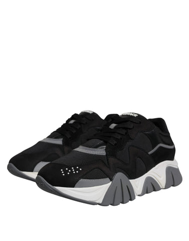 Versace Black leather and neoprene chunky low-top sneakers with thick soles and lace-up design.
