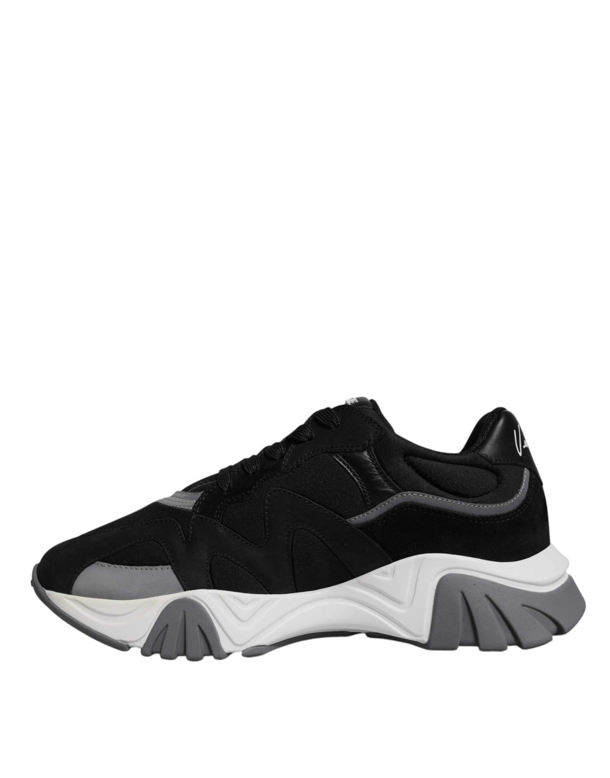 Versace black leather and neoprene chunky low-top sneakers with thick soles and modern design.