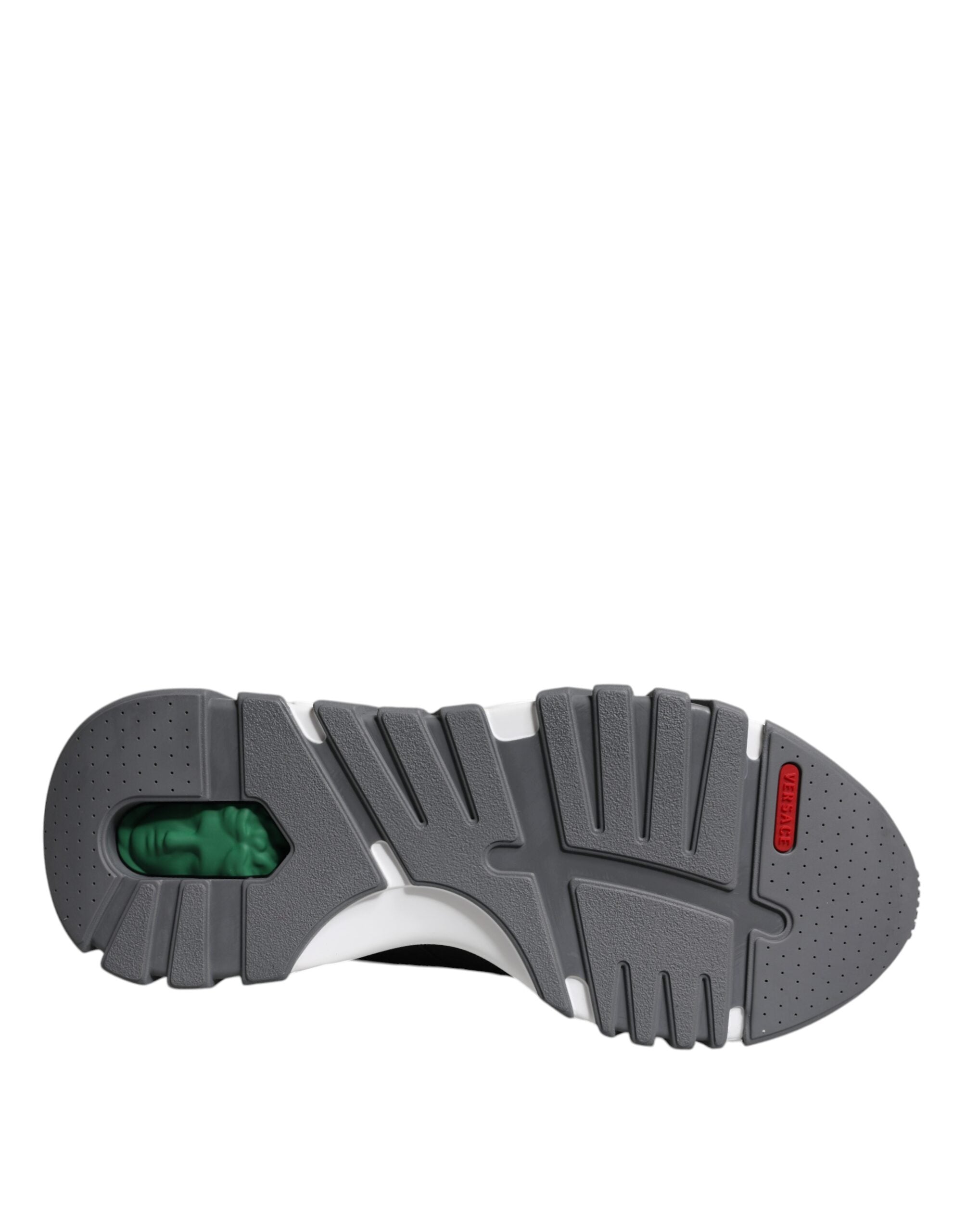 Versace Black leather and neoprene chunky low-top sneakers with thick rubber soles and stylish design.