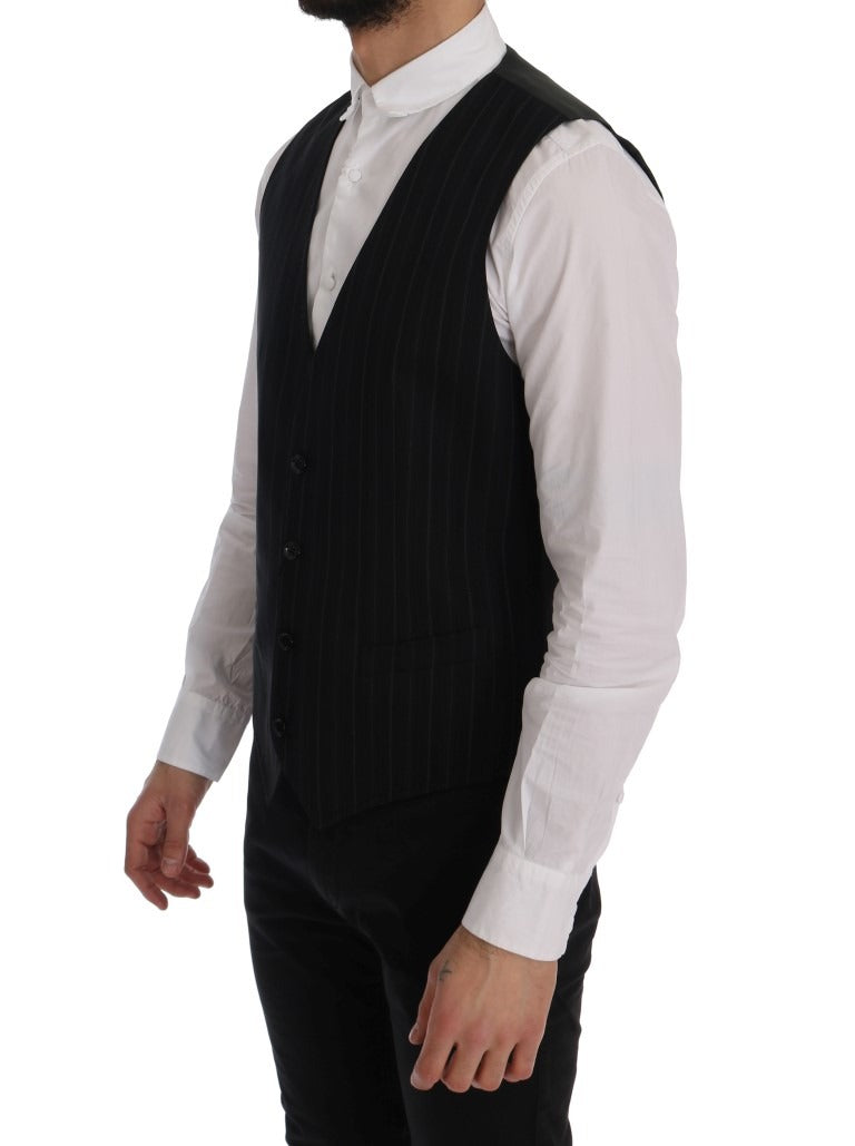 Black Dolce & Gabbana STAFF cotton striped vest displayed on a hanger, showcasing its classic striped pattern and sleeveless design.