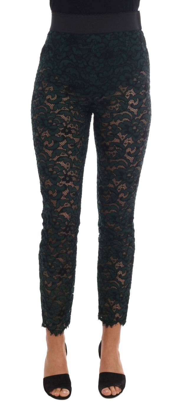 Green floral lace leggings pants by Dolce & Gabbana with intricate lace pattern and fitted design.