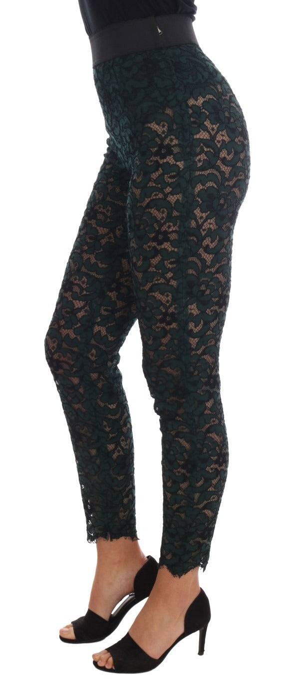 Green floral lace leggings pants by Dolce & Gabbana with intricate lace pattern and fitted design.