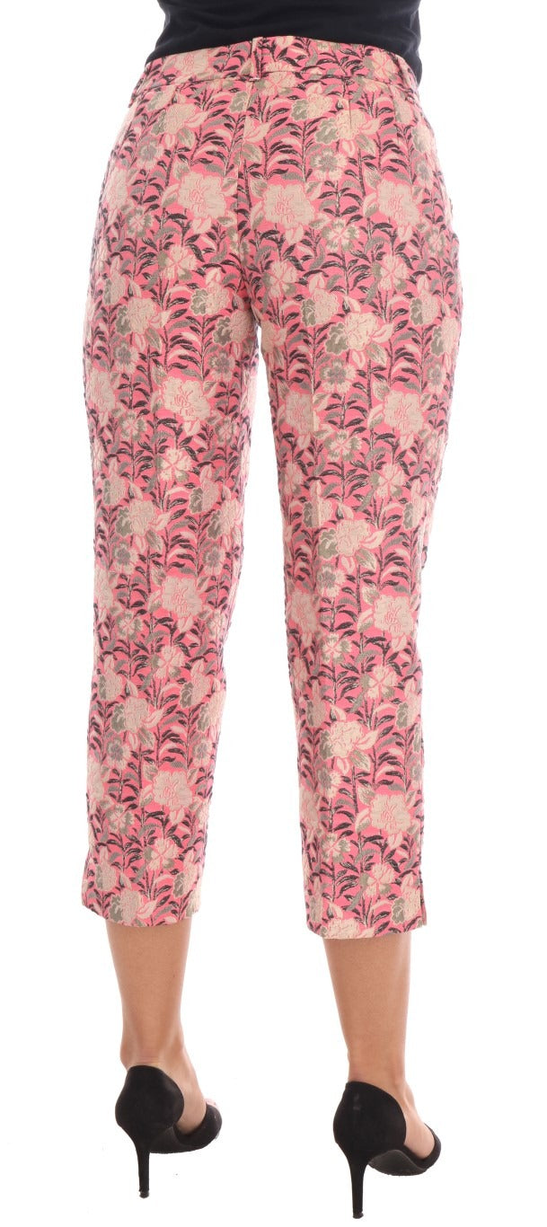Pink floral brocade Capri pants by Dolce & Gabbana, featuring intricate floral patterns and a stylish, tailored fit.