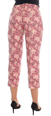 Pink floral brocade Capri pants by Dolce & Gabbana, featuring intricate floral patterns and a stylish, tailored fit.