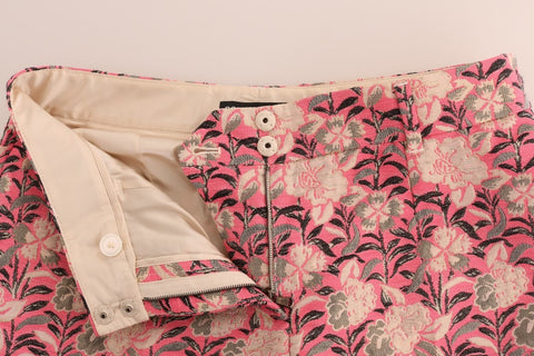 Pink floral brocade Capri pants by Dolce & Gabbana, showcasing intricate floral pattern and tailored fit.