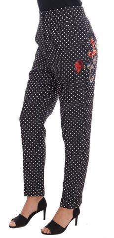 Black polka dot Sicily crystal pants by Dolce & Gabbana, featuring a tailored fit with crystal embellishments and polka dot pattern.