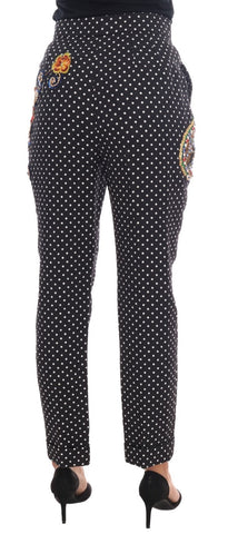 Black polka dot Sicily crystal pants by Dolce & Gabbana, featuring a tailored fit with crystal embellishments and polka dot pattern.