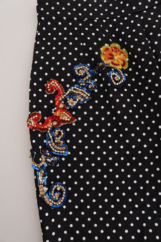 Black polka dot Sicily Crystal pants by Dolce & Gabbana, showcasing the stylish design and crystal embellishments.