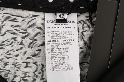 Black polka dot Sicily crystal pants by Dolce & Gabbana, featuring a tailored fit with crystal embellishments and stylish polka dot pattern.