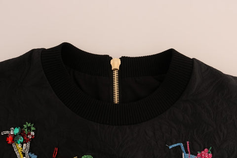 Black brocade crystal-embellished cocktail sweater by Dolce & Gabbana, featuring intricate fabric and sparkling crystal details.