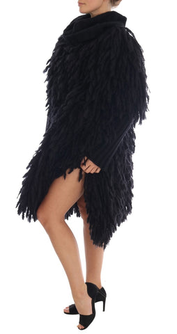 Black fringes wool pullover sweater by Dolce & Gabbana, featuring a cozy fit with decorative fringe details.