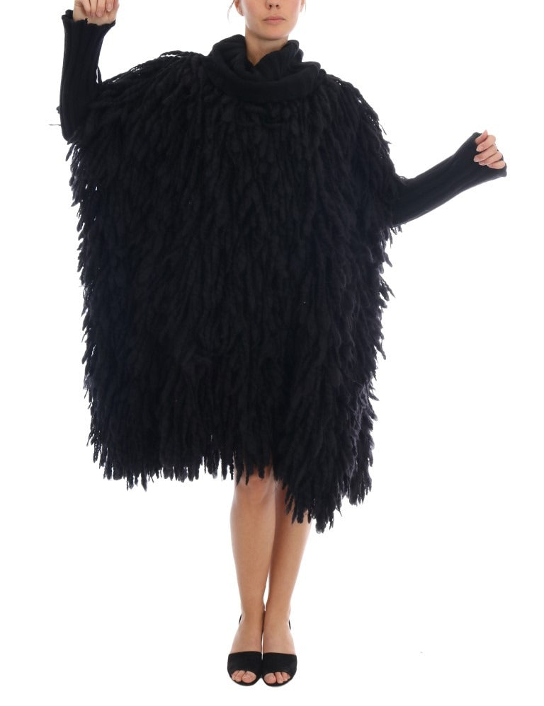 Black fringed wool pullover sweater by Dolce & Gabbana, featuring a cozy knit with stylish fringe details.