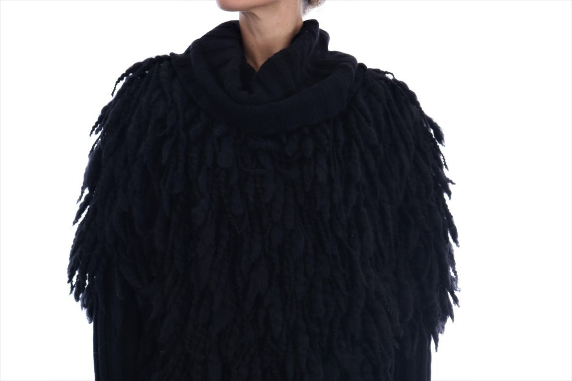 Black fringes wool pullover sweater by Dolce & Gabbana featuring textured knit and fringe detailing on the shoulders and sleeves.